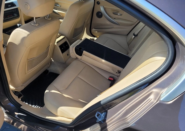 BMW Seria 3 cena 53000 przebieg: 296564, rok produkcji 2013 z Bełchatów małe 154